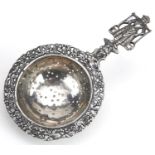 Dutch silver sifting spoon, the handle in the form of a female water carrier, 14cm in length, 53.