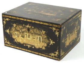 Chinese black lacquered tea caddy with pewter liner gilded with figures amongst pavilions and