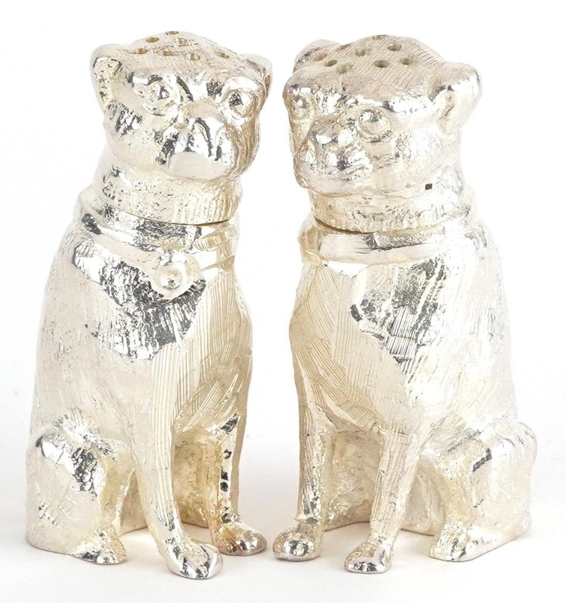 Pair of novelty silver plated salt and pepper casters in the form of dogs, each 6.5cm high : For