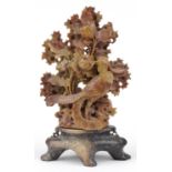 Chinese soapstone carving of a phoenix amongst flowers, 24cm high : For further information on