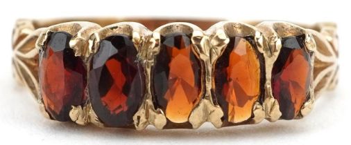 9ct gold garnet five stone ring, size L/M, 2.6g : For further information on this lot please visit