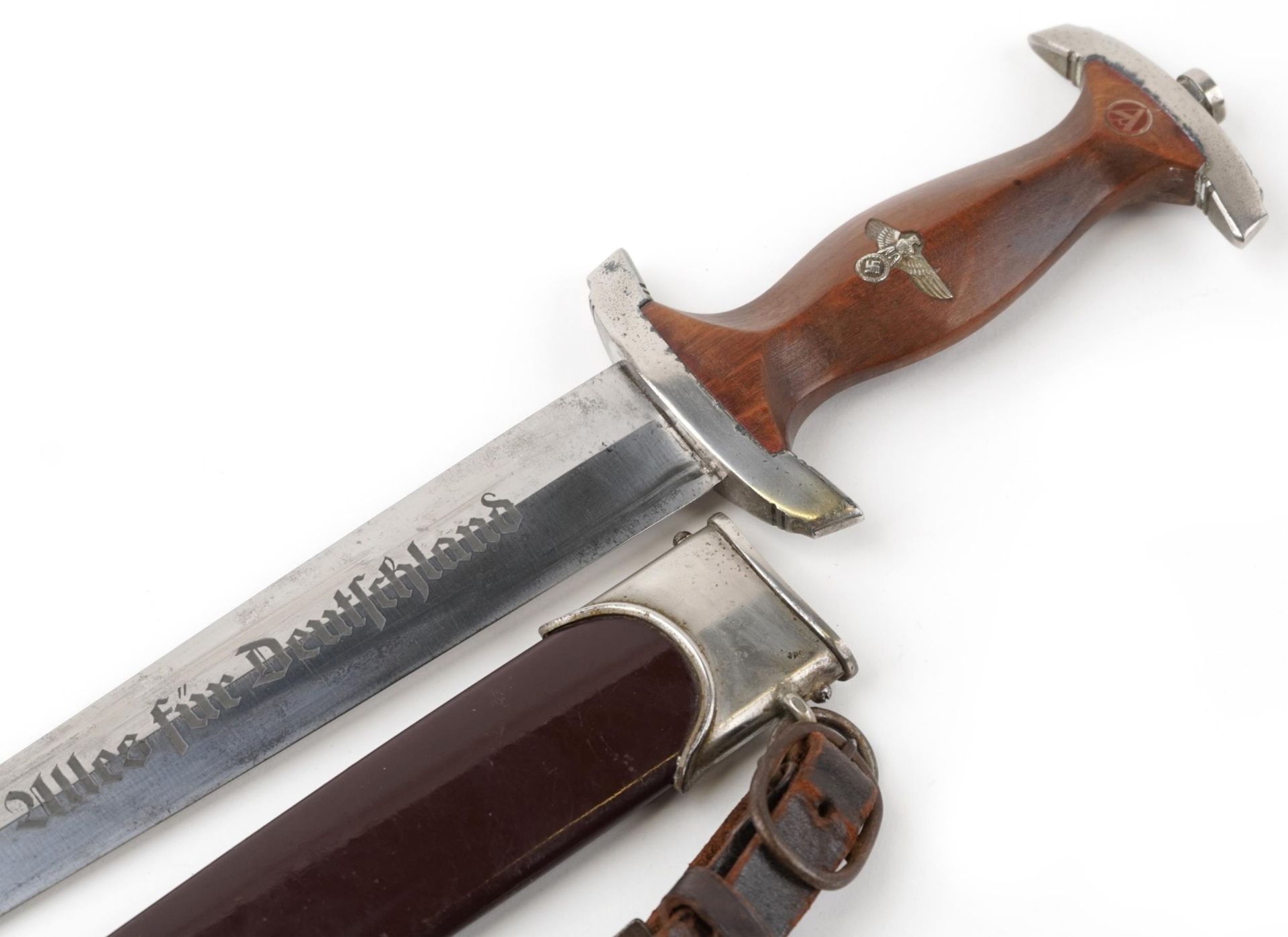 German military interest SA dagger with leather hangers, scabbard and steel blade engraved RZM M7/66