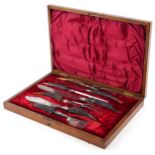 Victorian seven piece staghorn handled carving set with silver mounts housed in a Henry Wigful