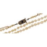 Pearl two row necklace with unmarked gold sapphire and diamond clasp, 42cm in length, 8.3g : For