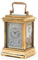 Miniature brass cased carriage clock with swing handle and Sevres style panels hand painted with