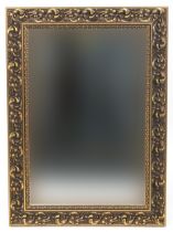 Ornate gilt framed mirror with bevelled glass, 93cm x 68cm : For further information on this lot