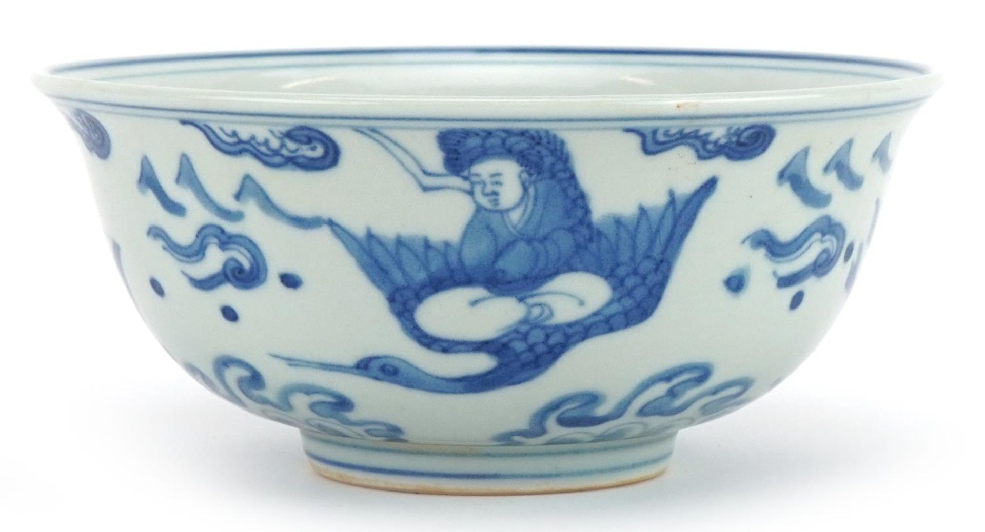 Chinese blue and white porcelain bowl hand painted with figures and animals above crashing waves,