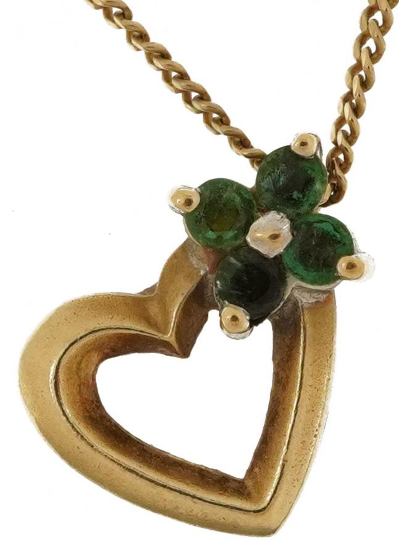 9ct gold emerald love heart pendant on a 9ct gold necklace housed in a Danbury Mint fitted box,