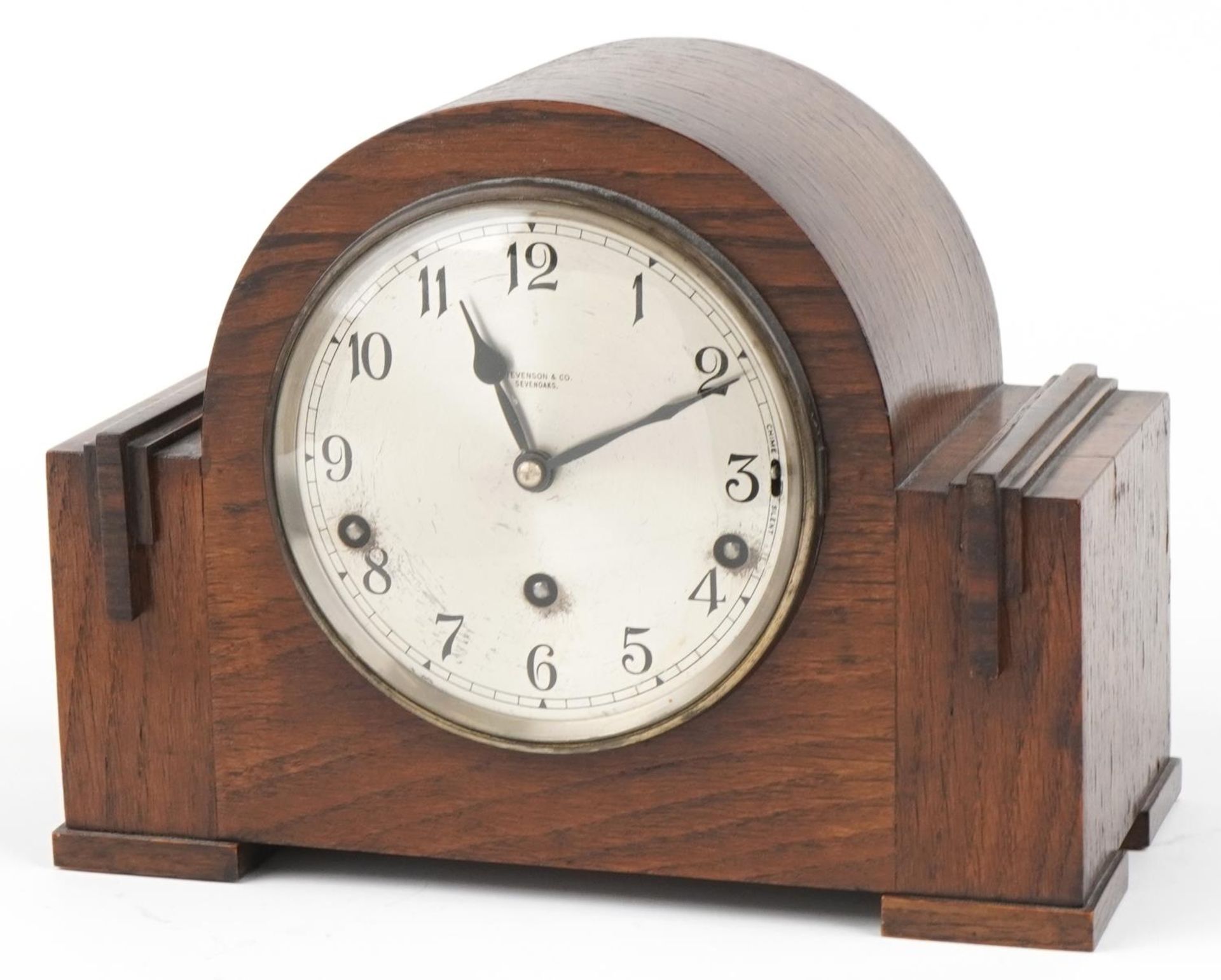 Oak cased Westminster chiming mantle clock with silvered dial inscribed Stevenson & Co Sevenoaks :