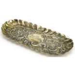 Charles I silver gilt oval dish embossed with flowers and foliage, incomplete maker's mark London