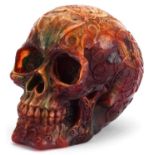 Large amber style study of a human skull, 13cm high : For further information on this lot please