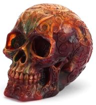 Large amber style study of a human skull, 13cm high : For further information on this lot please