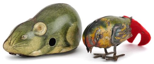 Two vintage tinplate clockwork animals comprising a mouse and bird, the largest 8.5cm in length :