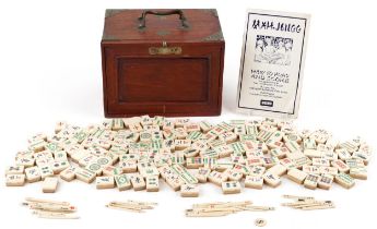 Chinese bone and bamboo mahjong set by j Jaques & Son housed in a hardwood five drawer chest with