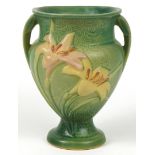 Roseville, American pottery twin handled vase decorated in relief with flowers, 21.5cm high : For