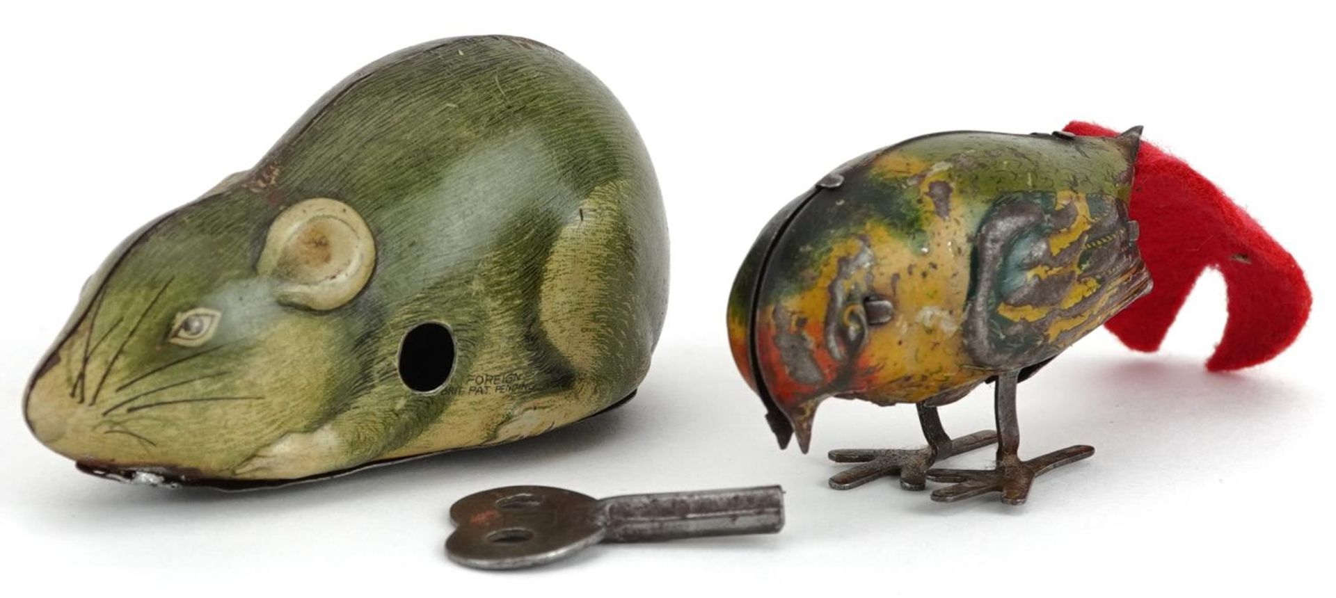 Two vintage tinplate clockwork animals comprising a mouse and bird, the largest 8.5cm in length : - Image 2 of 4