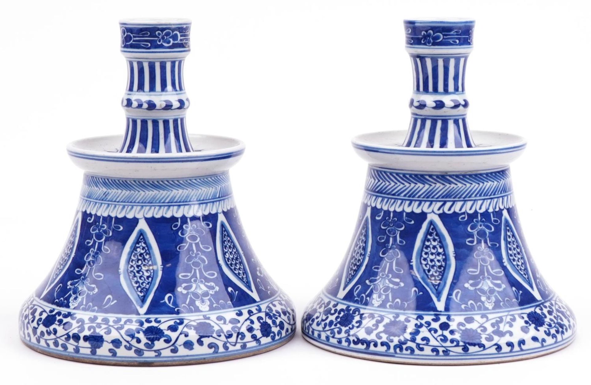 Pair of Chinese Islamic blue and white porcelain hookah bases hand painted with flowers, each 24cm