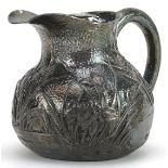 Japanese silver cream jug embossed with insects amongst flowers and reeds, impressed character marks