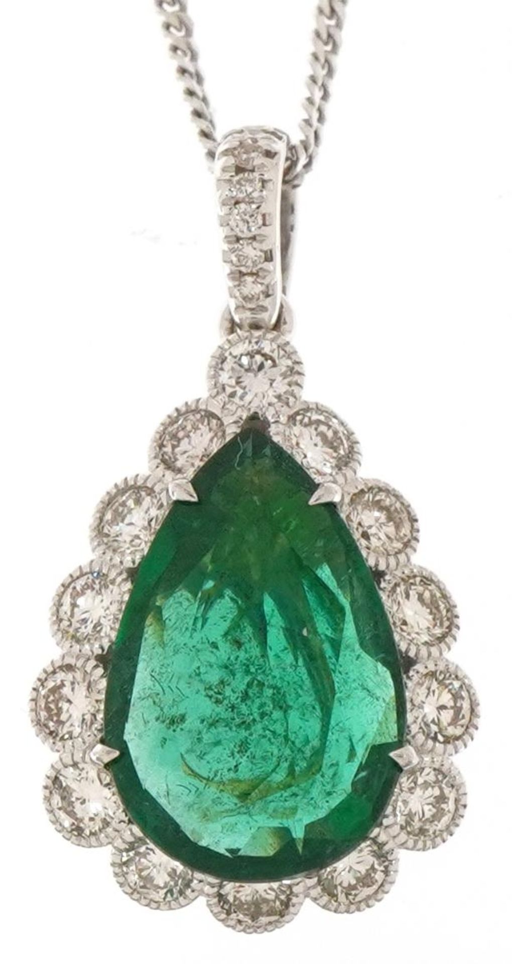 18ct white and yellow gold emerald and diamond teardrop pendant on a silver necklace, the emerald
