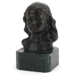 Patinated bronze head and shoulders bust of a young female raised on a green marble base, 15cm