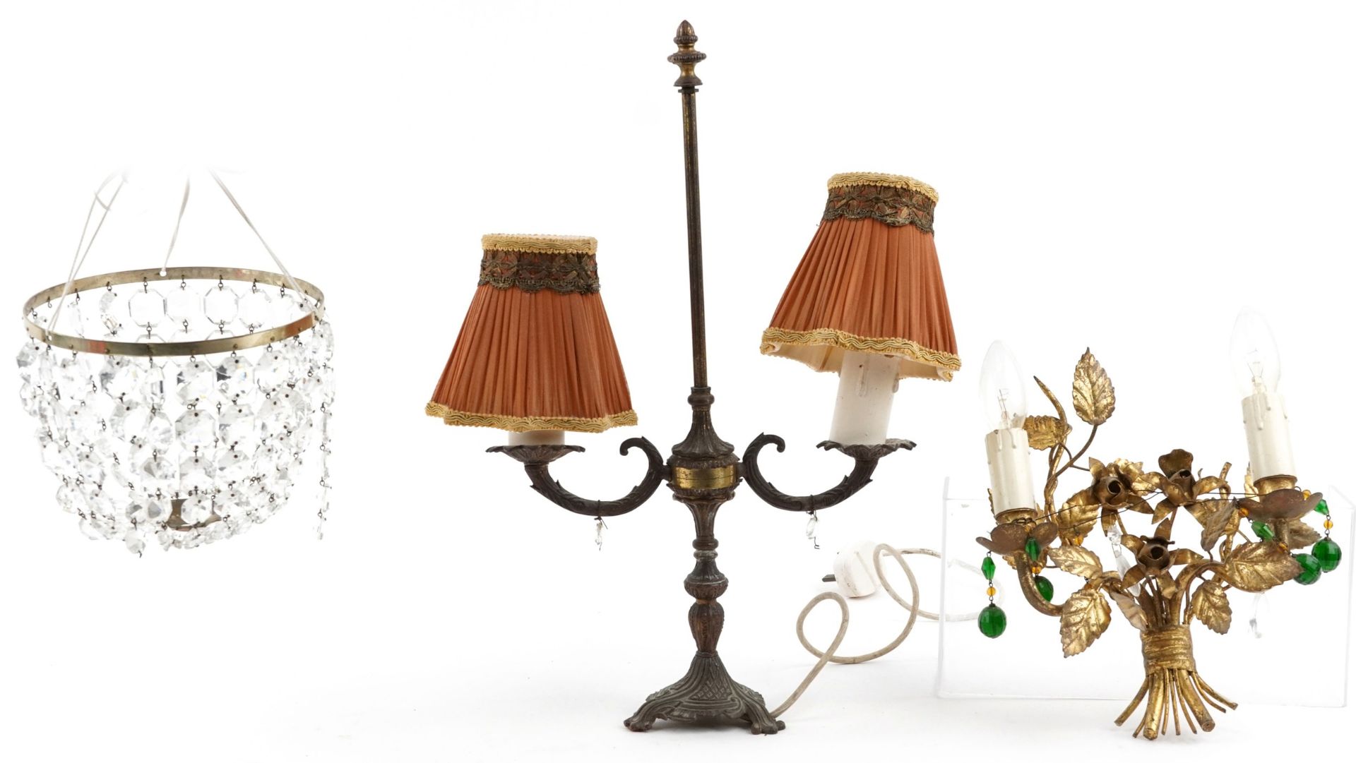 Lighting and fixtures comprising a bag chandelier with cut glass drops, French style gilt metal