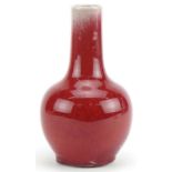 Chinese porcelain vase having a sang de boeuf glaze, four figure character marks to the base, 19cm