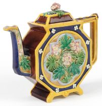 Brown Westhead Moore, Victorian aesthetic Majolica teapot decorated in relief with flowers, 22.5cm