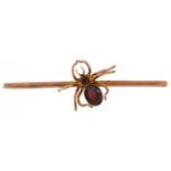 9ct gold garnet spider bar brooch, 7.5cm wide, 7.9g : For further information on this lot please