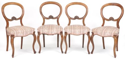 Set of four Victorian walnut spoon back dining chairs with salmon floral upholstered seats, 87cm