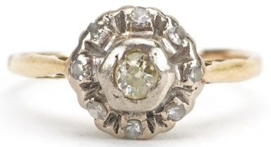 Unmarked gold diamond two tier cluster ring, tests as 18ct gold, the largest diamond approximately