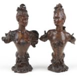 Pair of Art Nouveau patinated spelter busts of scantily dressed females with C scroll decoration,
