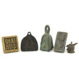 Chinese bronzes including two seals and an archaic style weight, the largest 6.5cm high : For