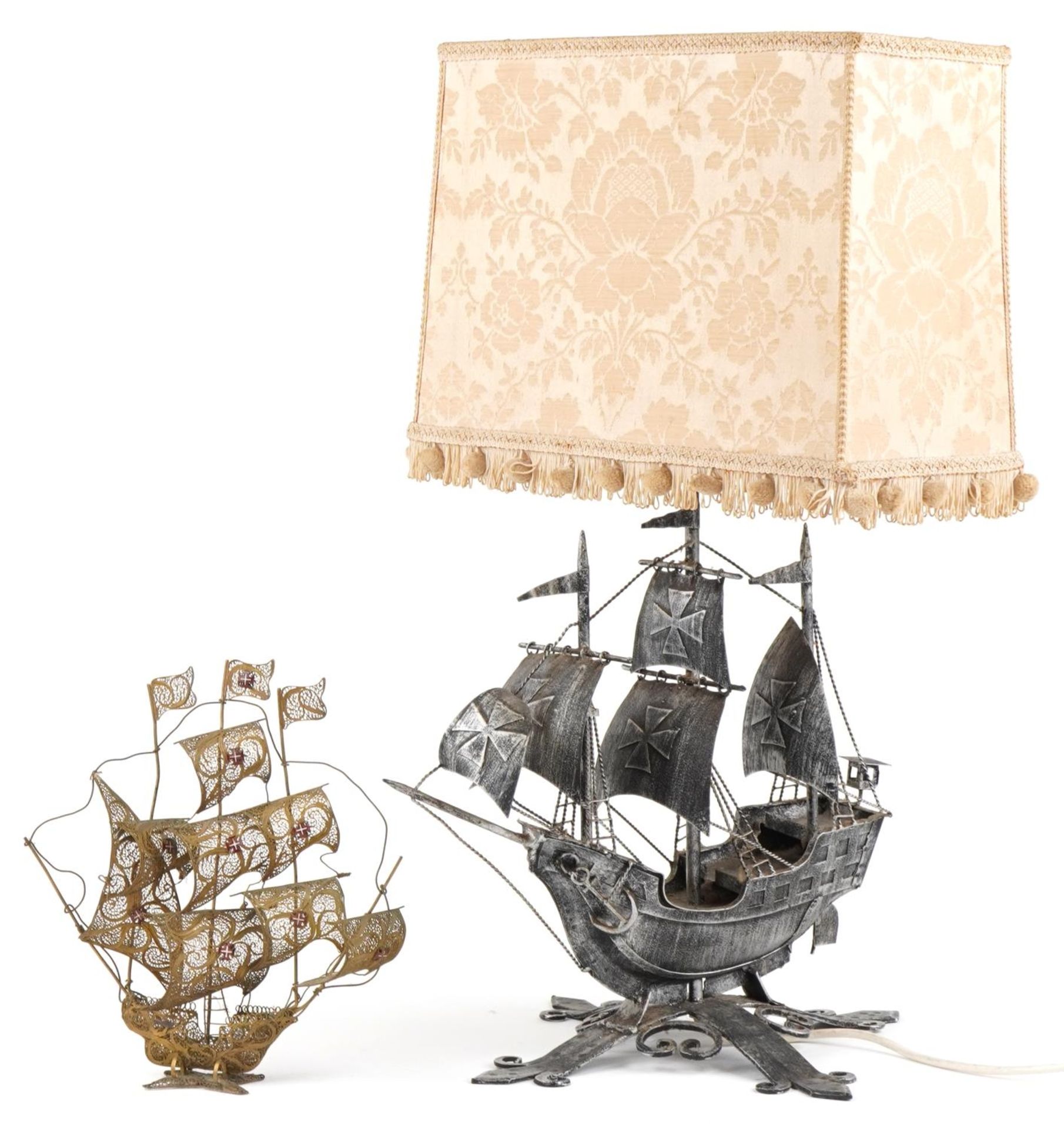 Silvered cast metal Maltese ship table lamp with shade and a similar gilt filigree sculpture, the