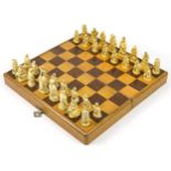 Chinese ivorine chess set housed in a fitted folding chess board, the chess board 39cm x 40cm :