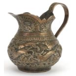 Anglo Indian unmarked silver cream jug embossed with wild animals, 7cm high, 101.8g : For further