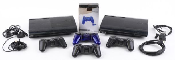 Two Sony PlayStation 3 games consoles with four controllers : For further information on this lot