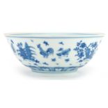 Chinese blue and white porcelain bowl hand painted with chickens in a landscape, six figure