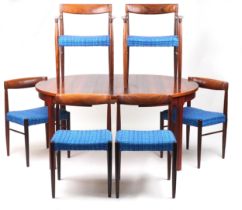 Bramin, Danish mid century rosewood circular extending dining table with two folding inserts and six