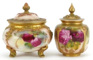 Royal Worcester, two Victorian pot pourri vases and covers hand painted with roses, numbered 183 and