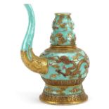 Chinese porcelain turquoise ground wine vessel gilded with dragons and bats amongst clouds, six