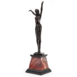 After Dimitri H Chiparus, patinated bronze statuette of a semi nude Art Deco female raised on a