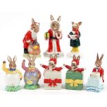 Nine Royal Doulton Bunnykins figures comprising Father Christmas Bunnykins, Santa Bunnykins, Happy