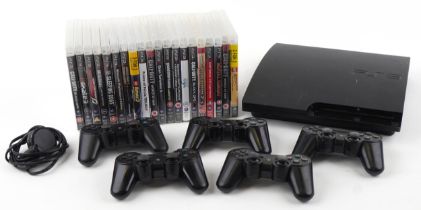 Sony PlayStation 3 games console with five controllers and a collection of games : For further