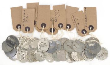 Collection of military interest metal dog tags, various names and army numbers : For further