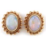 Pair of 9ct gold cabochon opal stud earrings, 10mm high, 0.9g : For further information on this
