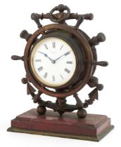 19th century patinated bronze and red marble mantle clock in the form of a ship's wheel with