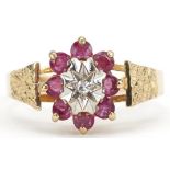 9ct gold ruby and diamond flower head ring with engine turned shoulders, size O, 2.2g : For