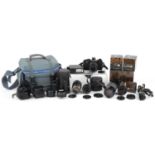 Canon OM-4 camera with various lenses and accessories, some with boxes : For further information