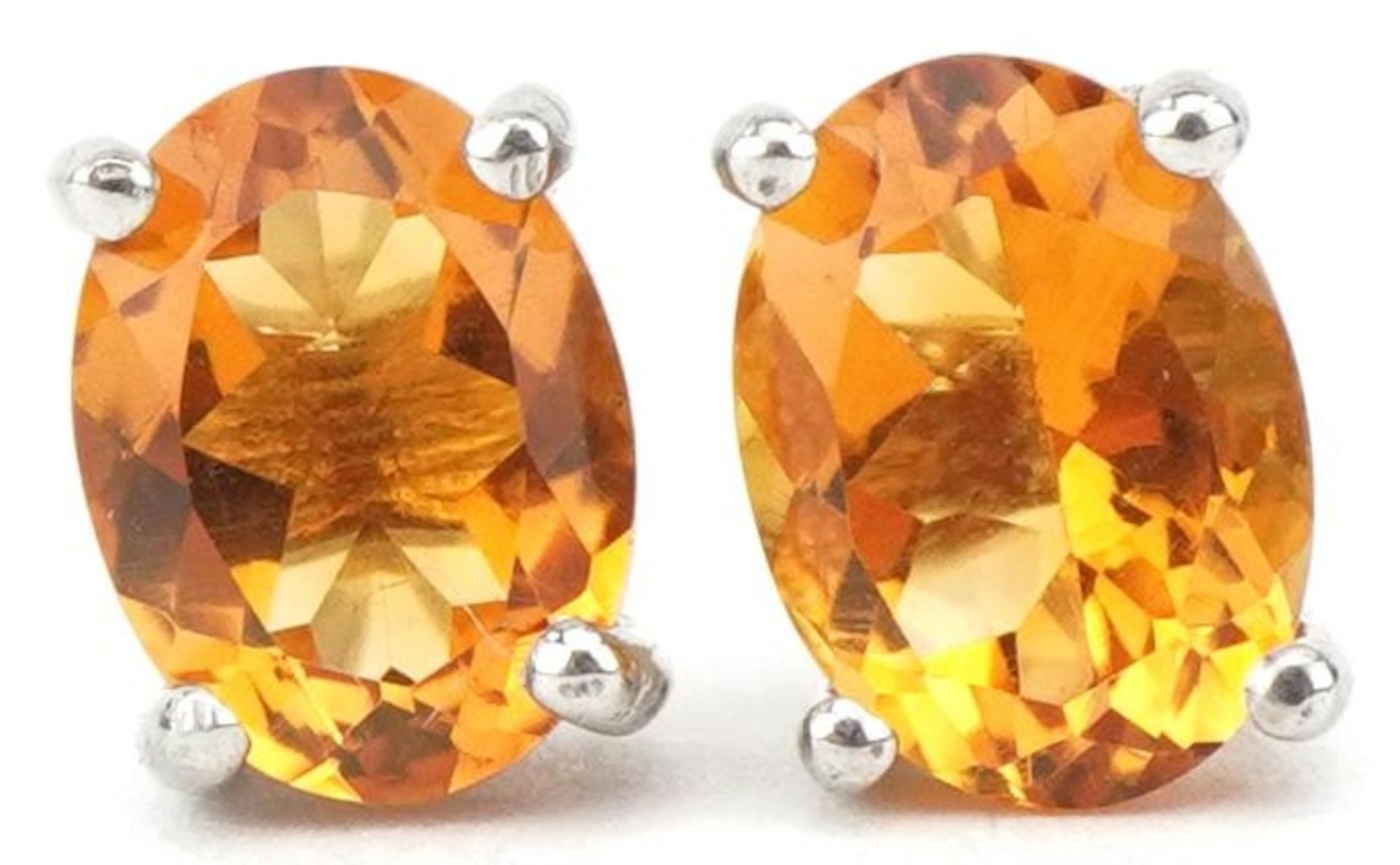 Pair of silver citrine stud earrings, 7.8mm high, 1.6g : For further information on this lot