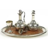 Miniature silver objects including oval tray, claret jug, decanter, goblet and funnel, various